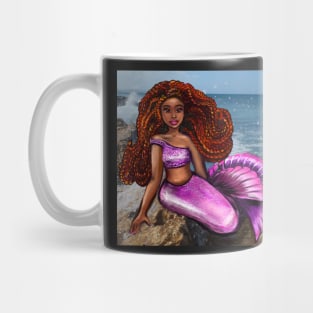 Mermaid relaxing on the rocks  with brown eyes, flowing Afro hair and caramel brown skin Mug